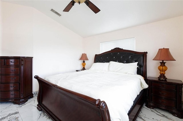 bedroom with visible vents, marble finish floor, a ceiling fan, and lofted ceiling