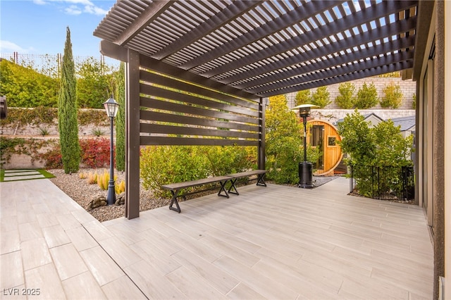 wooden terrace with a pergola
