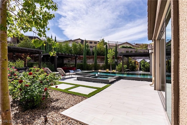12119 Castilla Rain Ave, Las Vegas, NV 89138 - view of yard with a pergola, a patio, fence, and a pool with connected hot tub