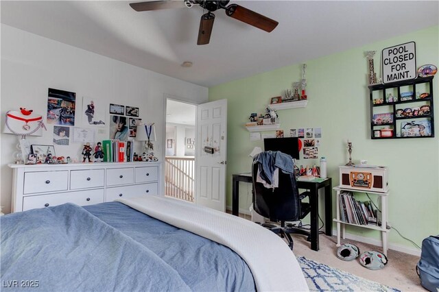 bedroom featuring a ceiling fan, carpet flooring, and baseboards