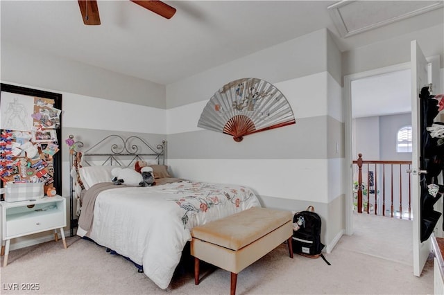 bedroom featuring ceiling fan and carpet floors
