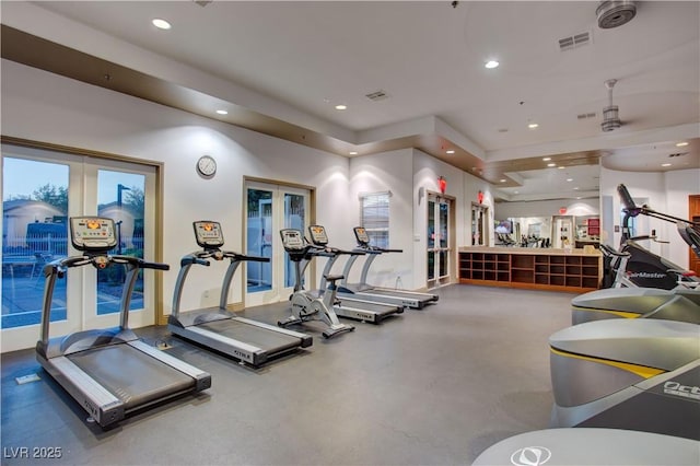 workout area with french doors, recessed lighting, and visible vents