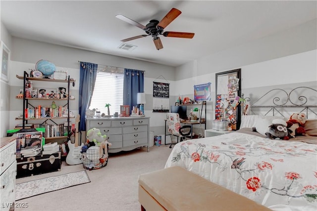 bedroom with visible vents, ceiling fan, and carpet