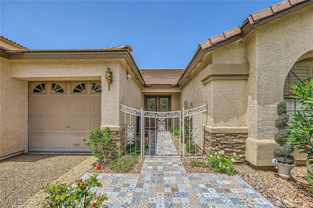521 Dawn Cove Dr, Henderson, NV 89052 - entrance to property featuring stucco siding, stone siding, and an attached garage