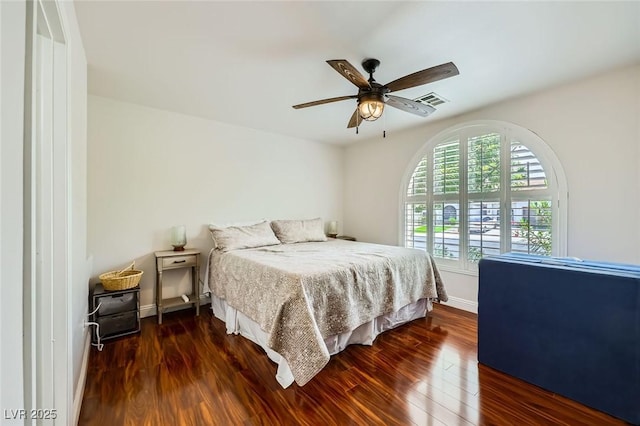 521 Dawn Cove Dr, Henderson, NV 89052 - bedroom with dark wood-type flooring, baseboards, and ceiling fan