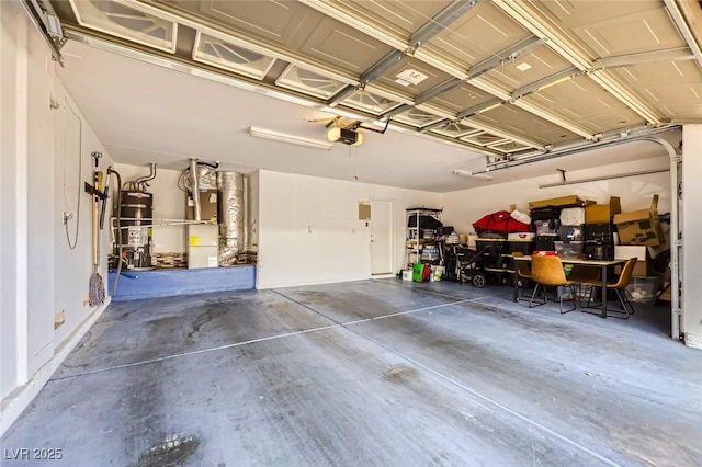 521 Dawn Cove Dr, Henderson, NV 89052 - garage featuring water heater and a garage door opener