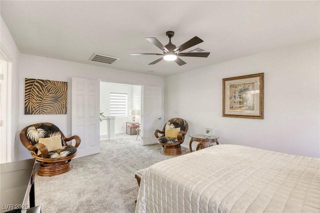 bedroom featuring visible vents, a ceiling fan, and carpet flooring