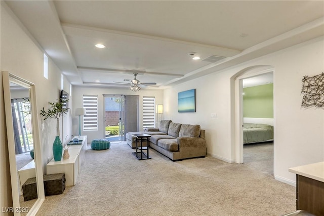 living area featuring recessed lighting, carpet flooring, and plenty of natural light