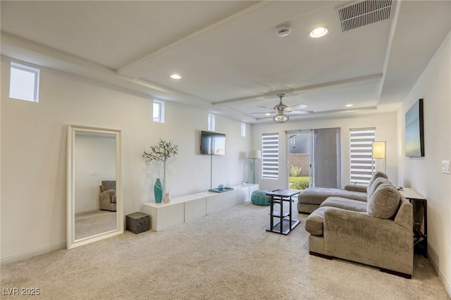 carpeted living area with recessed lighting, visible vents, and ceiling fan
