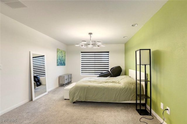 carpeted bedroom featuring baseboards, visible vents, and a notable chandelier