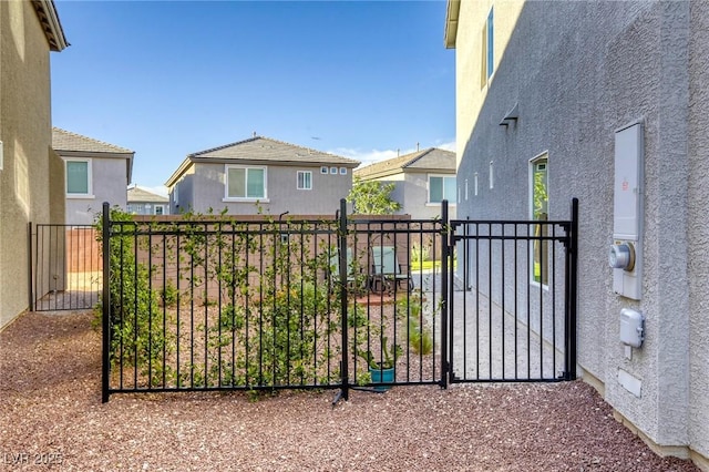 exterior space featuring fence and a residential view
