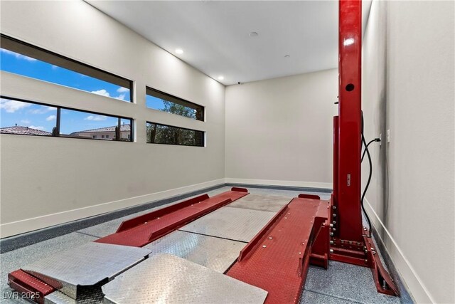miscellaneous room with baseboards and recessed lighting
