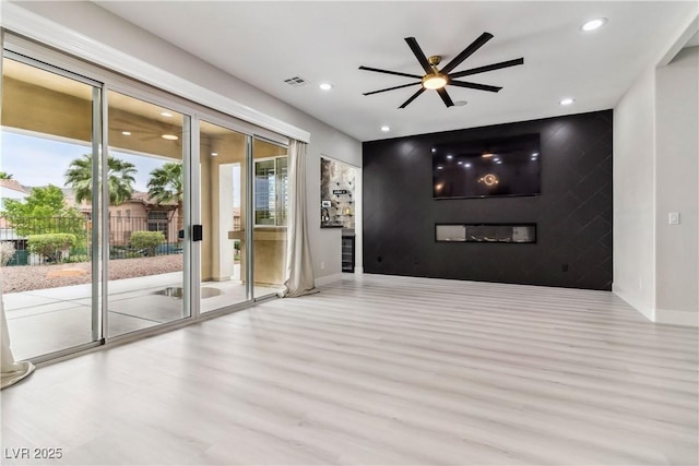 1185 Via Casa Palermo, Henderson, NV 89011 - unfurnished room featuring wood finished floors, ceiling fan, baseboards, visible vents, and recessed lighting