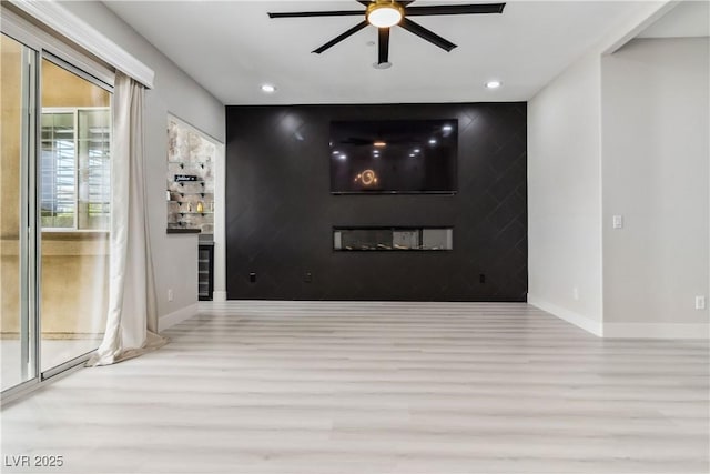 1185 Via Casa Palermo, Henderson, NV 89011 - unfurnished room featuring baseboards, a ceiling fan, wood finished floors, and recessed lighting
