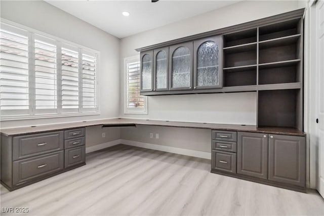 1185 Via Casa Palermo, Henderson, NV 89011 - unfurnished office with light wood finished floors, baseboards, built in desk, and recessed lighting