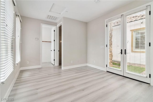 1185 Via Casa Palermo, Henderson, NV 89011 - unfurnished bedroom with attic access, french doors, light wood-type flooring, visible vents, and access to outside