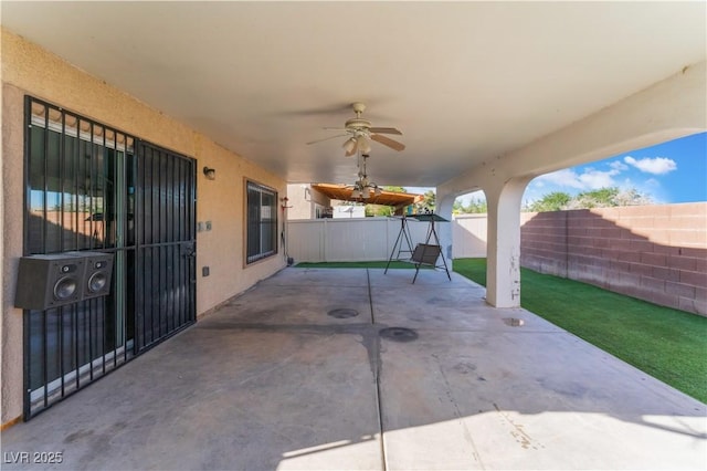 1618 Meno Peak St, Las Vegas, NV 89115 - view of patio / terrace with a fenced backyard and ceiling fan