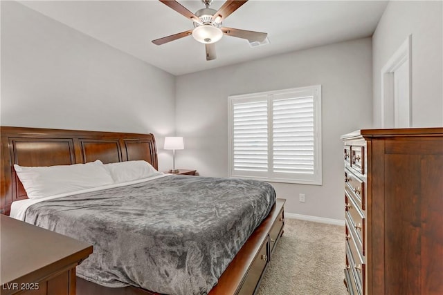 8351 Gold River Ct, Las Vegas, NV 89113 - bedroom featuring ceiling fan, baseboards, and light carpet