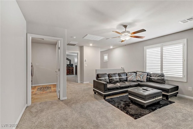 8351 Gold River Ct, Las Vegas, NV 89113 - living room featuring baseboards, a ceiling fan, visible vents, and carpet