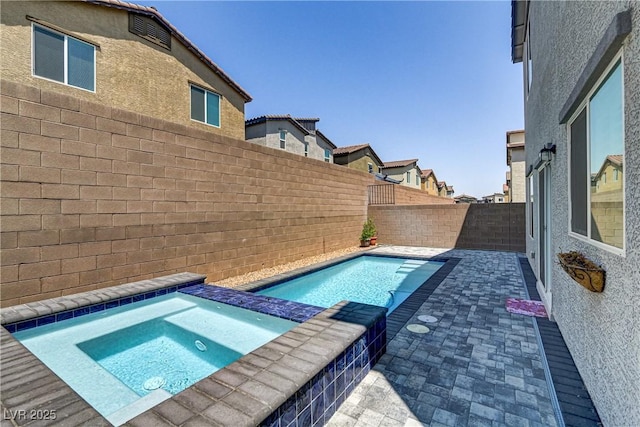 8351 Gold River Ct, Las Vegas, NV 89113 - view of swimming pool featuring an in-ground hot tub, a fenced backyard, and a patio area