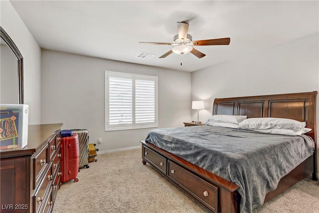 8351 Gold River Ct, Las Vegas, NV 89113 - bedroom featuring light colored carpet, baseboards, a ceiling fan, and visible vents