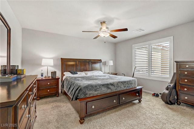 8351 Gold River Ct, Las Vegas, NV 89113 - bedroom with baseboards, a ceiling fan, visible vents, and light colored carpet