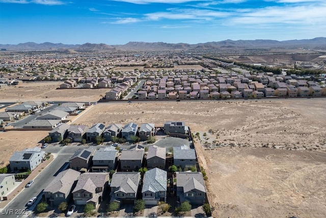 drone / aerial view with a residential view and a mountain view