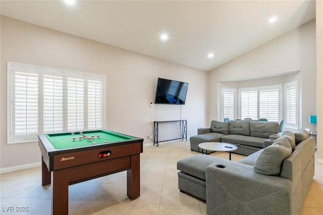 recreation room with recessed lighting, baseboards, vaulted ceiling, and light tile patterned flooring
