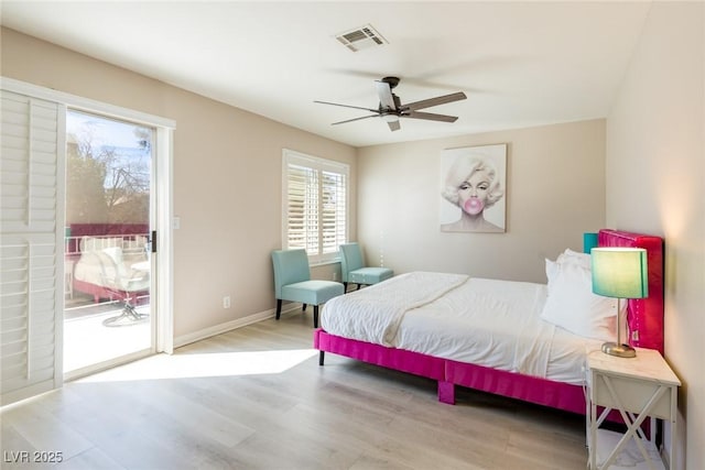 bedroom with access to outside, baseboards, a ceiling fan, visible vents, and wood finished floors