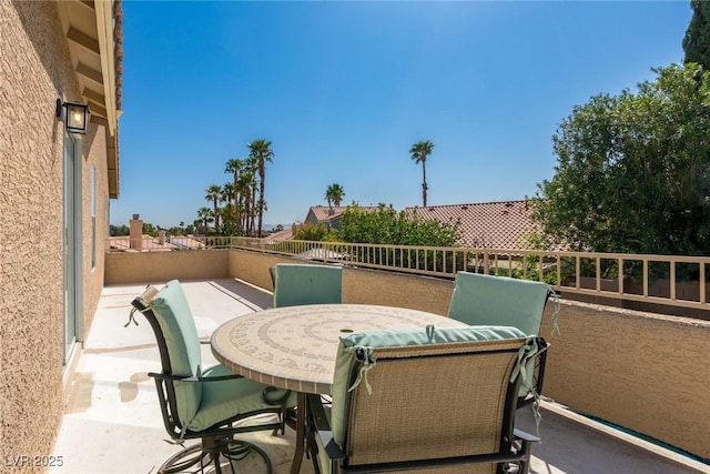view of patio with a balcony