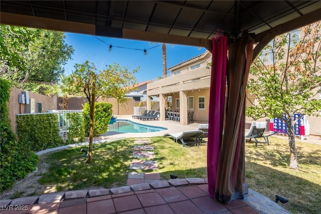 view of pool with a fenced in pool, a patio area, and a fenced backyard