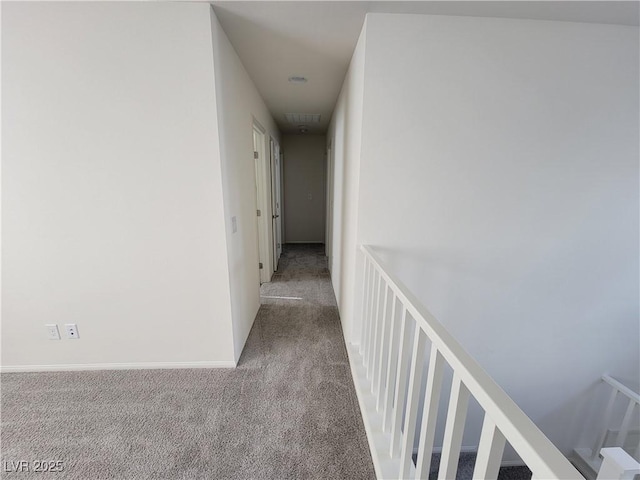corridor with carpet floors