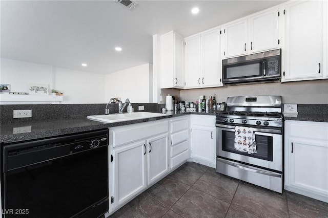 kitchen with white cabinets, dishwasher, a sink, dark countertops, and stainless steel range with gas cooktop