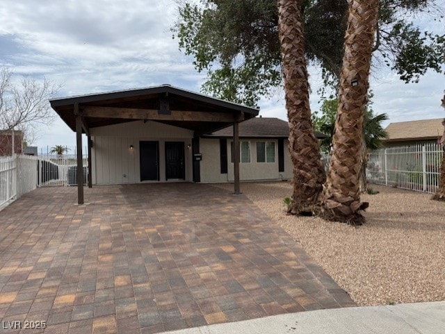 432 Anchor St, Las Vegas, NV 89110 - view of front of property with a carport, a patio area, fence, and driveway