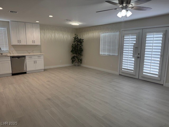 432 Anchor St, Las Vegas, NV 89110 - interior space with recessed lighting, french doors, a ceiling fan, and light wood-style flooring