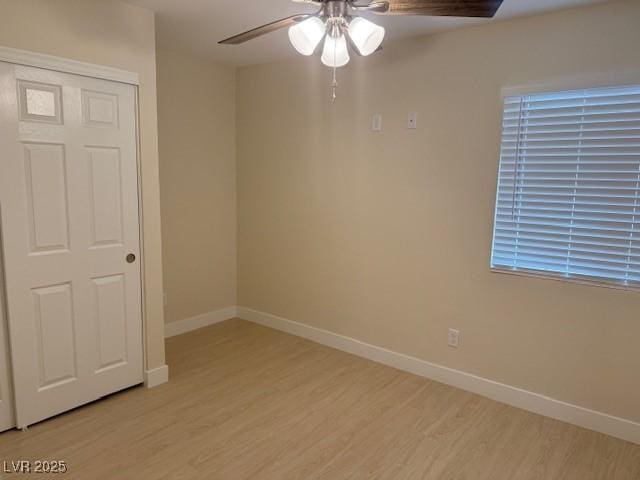 432 Anchor St, Las Vegas, NV 89110 - spare room with light wood-style floors, baseboards, and ceiling fan