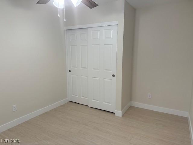 432 Anchor St, Las Vegas, NV 89110 - unfurnished bedroom with a closet, light wood-style floors, baseboards, and ceiling fan