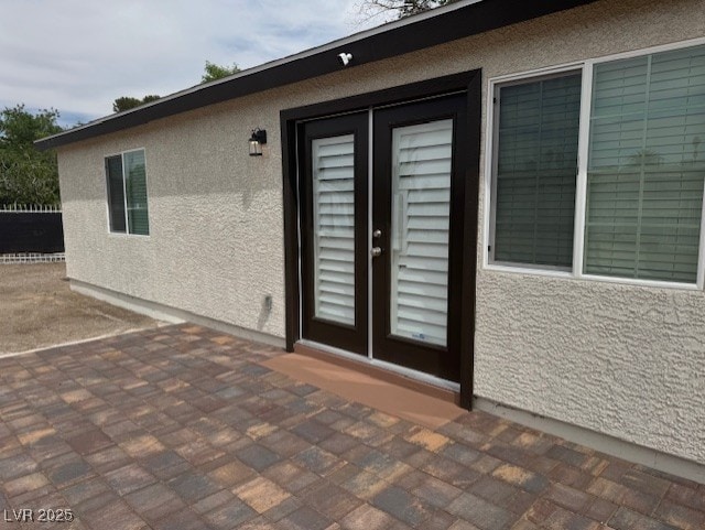 432 Anchor St, Las Vegas, NV 89110 - doorway to property with stucco siding