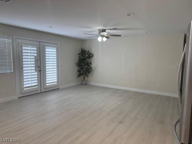432 Anchor St, Las Vegas, NV 89110 - unfurnished room featuring visible vents, ceiling fan, light wood-style floors, and baseboards
