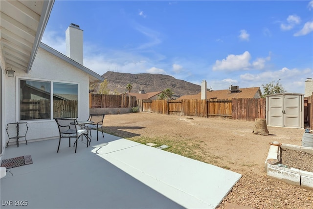 468 Potomac St, Henderson, NV 89015 - fenced backyard with a patio and a mountain view