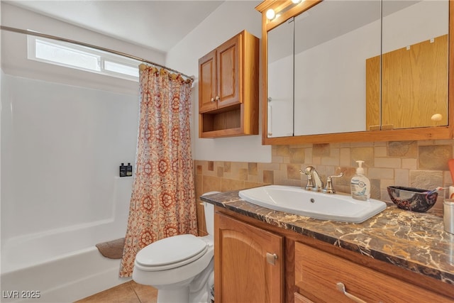 468 Potomac St, Henderson, NV 89015 - bathroom featuring vanity, toilet, tile patterned flooring, decorative backsplash, and shower / tub combo