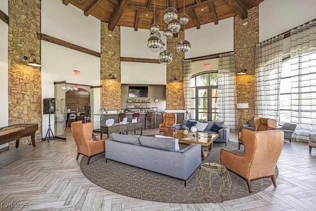 109 Reverie Heights Ave, Henderson, NV 89011 - common area with a high ceiling and wooden ceiling with exposed beams