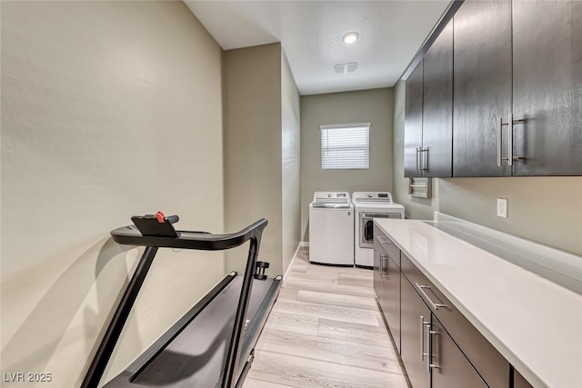 109 Reverie Heights Ave, Henderson, NV 89011 - laundry area featuring separate washer and dryer and light wood finished floors