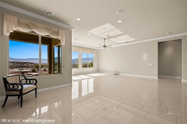 empty room featuring crown molding, baseboards, visible vents, and recessed lighting