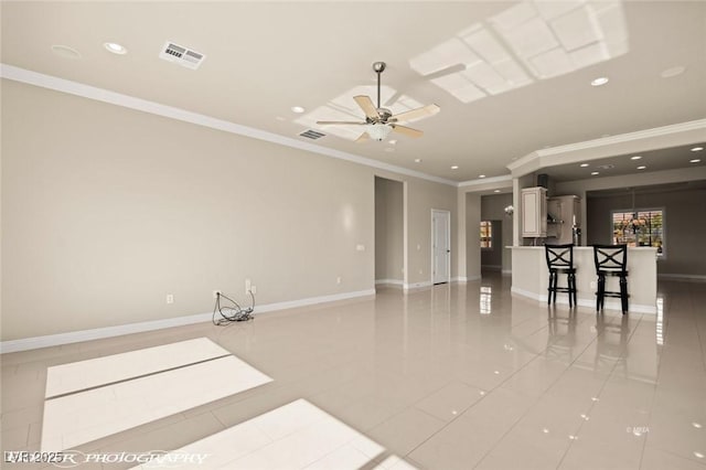 unfurnished room featuring ornamental molding, light tile patterned flooring, visible vents, and recessed lighting