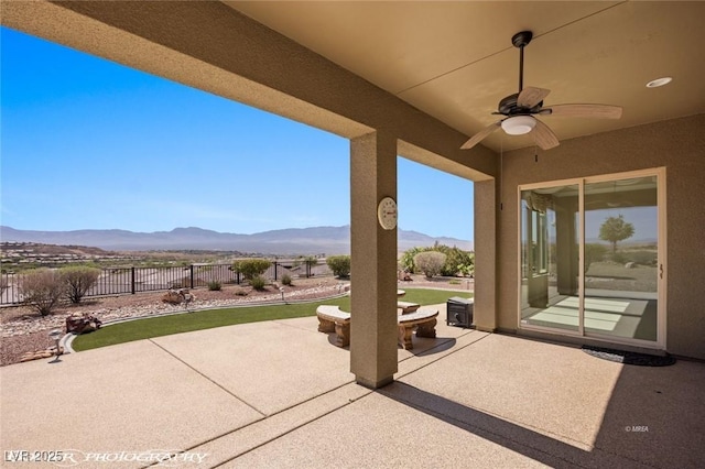 1348 Basin Vw, Mesquite, NV 89034 - view of patio / terrace featuring a mountain view and ceiling fan