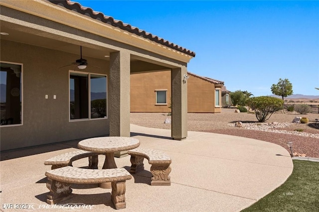 view of patio / terrace with a ceiling fan