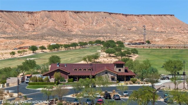 mountain view featuring view of golf course