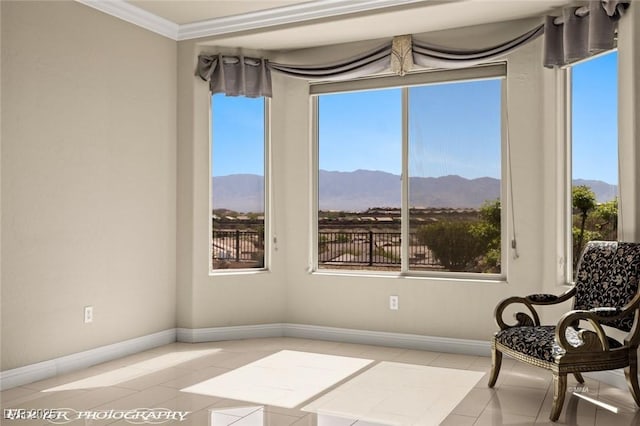 1348 Basin Vw, Mesquite, NV 89034 - sitting room featuring a mountain view, tile patterned flooring, baseboards, plenty of natural light, and ornamental molding