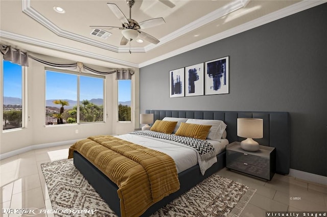 tiled bedroom featuring a tray ceiling, crown molding, visible vents, and baseboards